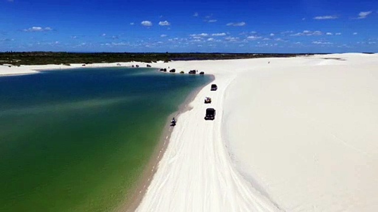 Shore beach with cars