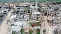 Drone shots show destruction in Idlib village near key Syria highways