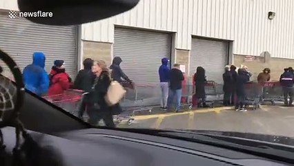 Coronavirus fears see locals form huge queues at supermarket in Ontario, Canada
