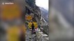 Huge landslide tears down Indian mountainside and blocks major road