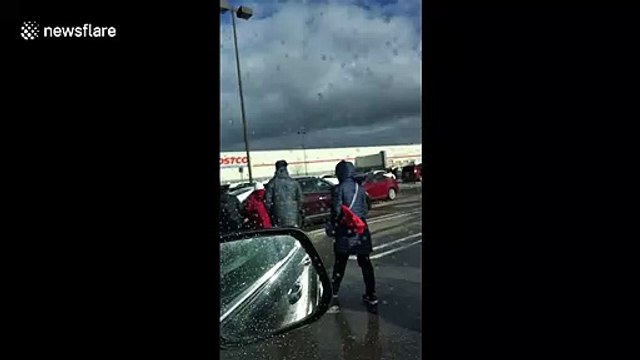 Coronavirus: Costco line goes around parking lot during panic buying spree