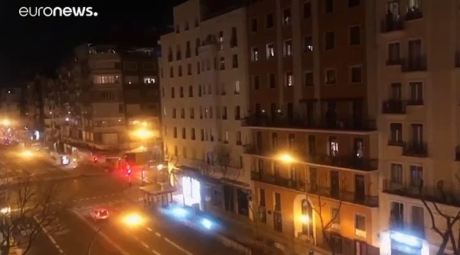 Spanish take to their balconies to applaud medical staff battling coronavirus