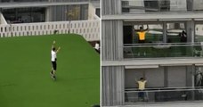 Séville : Un professeur de fitness dispense des cours aux habitants confinés chez eux depuis le toit d'un bâtiment