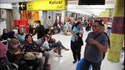 Indonesian train station sprayed with disinfectant amid COVID-19 fears