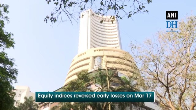 Equity indices volatile amid losses in global markets, Yes Bank gains by 30%
