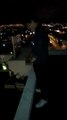 Drunk Guy Pushes Friend Over Roof onto DJ