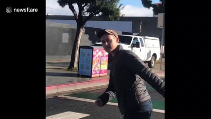 'Where's your compassion?' Shocking moment LA residents rob and harass homeless man amid coronavirus lockdown