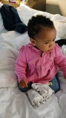 Daughter Tasting Scorpion from Candy Sucker