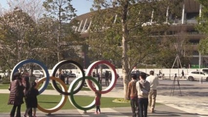 Los japoneses acogen con dudas y resignación el aplazamiento de los JJOO