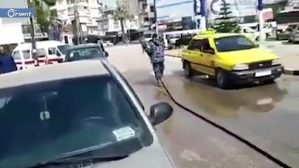 حكومة الأسد تقوم برش مبيد حشري في الشوارع للقضاء على فيروس "كورونا"