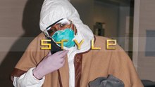 Naomi Campbell goes through LAX in hazmat suit to protect herself from corona virus