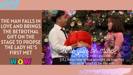 The man falls in love and brings the betrothal gift on the stage to propose the lady he's first met