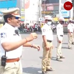 Hyderabad police approach people at signals to spread awareness on COVID-19