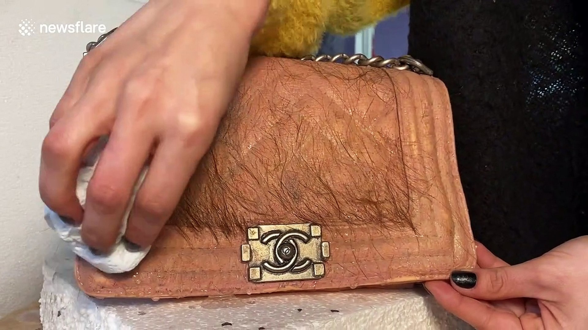 Artist makes uncomfortably realistic human skin handbag