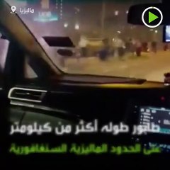 هربا من الكورونا.. طابور بطول كيلومتر عند معبر سنغافورة الحدودي في ماليزيا