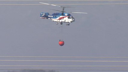 강풍 속 21시간 만에 산불 진화...추락 헬기 실종자 수색 중 / YTN