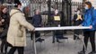 Activists block Downing Street gates with dinner table in protest to government approach to coronavirus