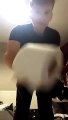 Guy Smashes Cup While Foot Juggling With Toilet Paper Roll -