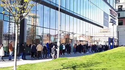 Giant queues snake around whole London supermarket as panic buying continues