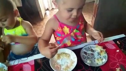 Twin Babies Eating Together