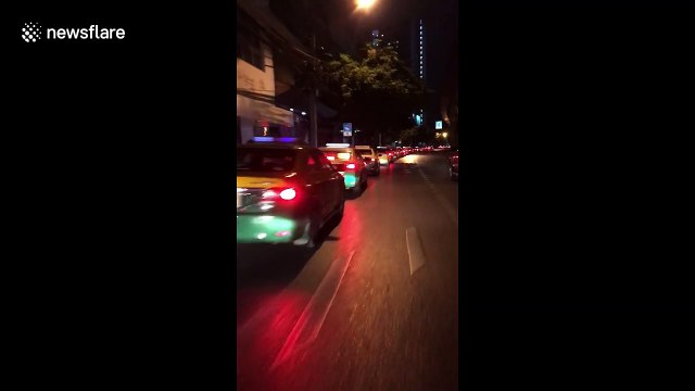 Hundreds of taxis wait for customers as COVID-19 decimates tourism in Bangkok