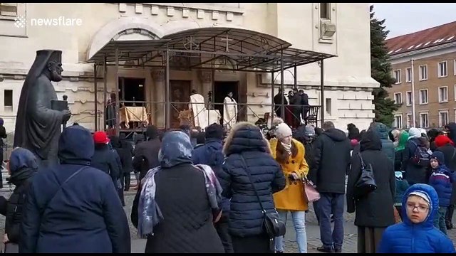 Orthodox priests in Romania give Communion using same spoon for hundreds of attendees during COVID19 outbreak