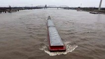 River Boat Barge passing under the Eads Bridge in St. Louis, MO