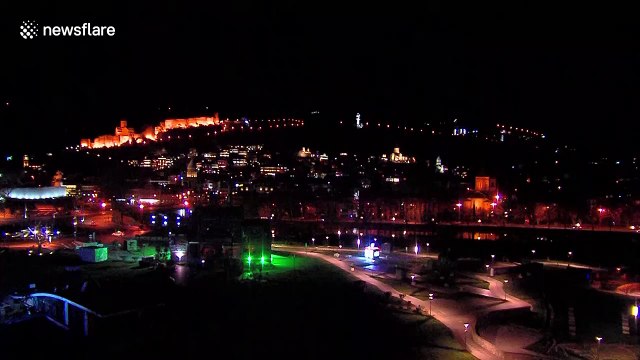 Landmarks in Georgian capital light up with colours of Italian flag in show of support