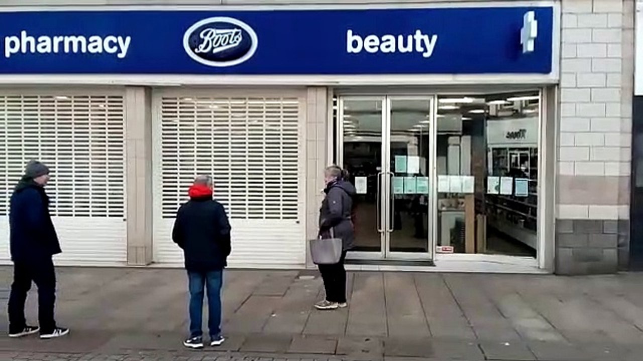 Long queues form outside Boots's pharmacy in the centre of South Shields