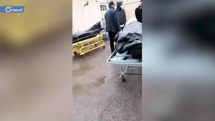 لا مكان للضحايا الجدد.. شاهد تكدس جثث المتوفين بفيروس كورونا في مشهد الإيرانية