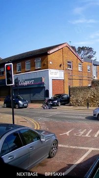 Biker Tumbles Over Bonnet
