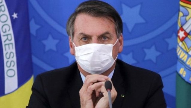 Brezilya Devlet Başkanı Bolsonaro, maske takıp koronavirüs için Basit bir grip dedi
