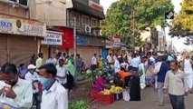 People violate social distancing rule amid India lockdown in Karnataka’s Hubli