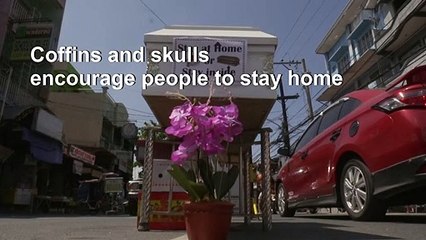 Coffins and skulls encourage people to stay home in The Philippines