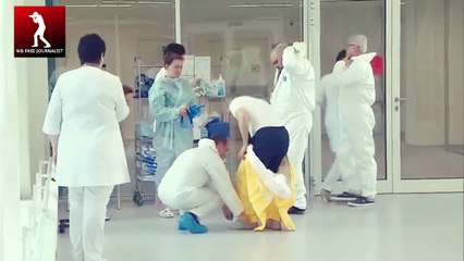 بوتين  يزور مركز مكافحة  فيروس كورونا  ببدلة  واقية