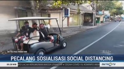 Pecalang Sosialisasikan Pentingnya <i>Social Distancing</i>