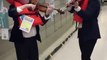 Girls Play Sad Violin Near Empty Toilet Paper Aisle in Store Amid Coronavirus Lockdown