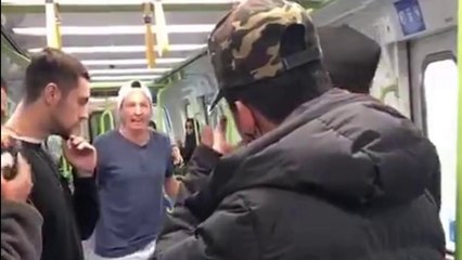 Hurling racist in commuters, Melbourne Australia