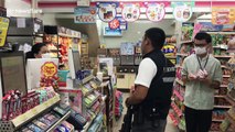 Armed police guard supermarkets in Thailand amid fears of coronavirus crime surge
