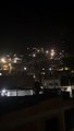 Sob ameaça de coronavírus e tiroteios, moradores do Morro do Romão cantam louvor