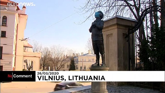 Coronavirus: masked statues make cultural comment and health reminder in Lithuania