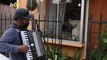 Man Serenades Self-Isolating Parents on Accordion Outside Their Home While They Dance