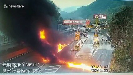 Semi-trailer bursts into flames after crashing into road barriers on Chinese highway