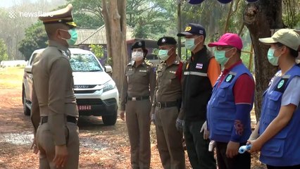 Thai police check cars travelling between provinces during coronavirus restrictions