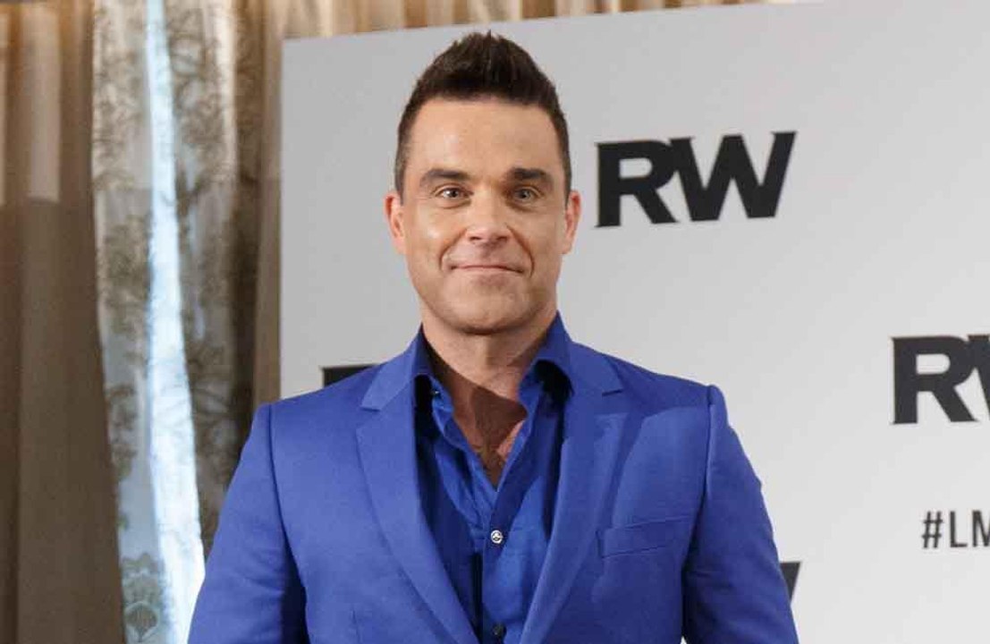 Robbie Williams reignites feud with 'd***head' Liam Gallagher