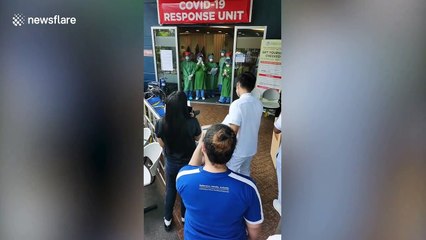 Emotional moment well-wishers sing to doctors and nurses treating coronavirus patients