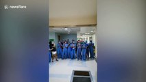 Colleagues sing for medics treating Covid-19 patients in the Philippines