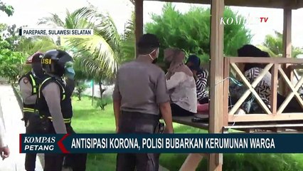 Polisi Bubarkan Kerumunan Warga Untuk Cegah Corona