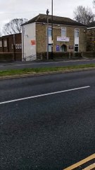 Motorcyclist performs wheelie into oncoming traffic on Sheffield road