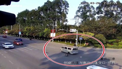 Tyre knocks pedestrian over after falling from minibus in China